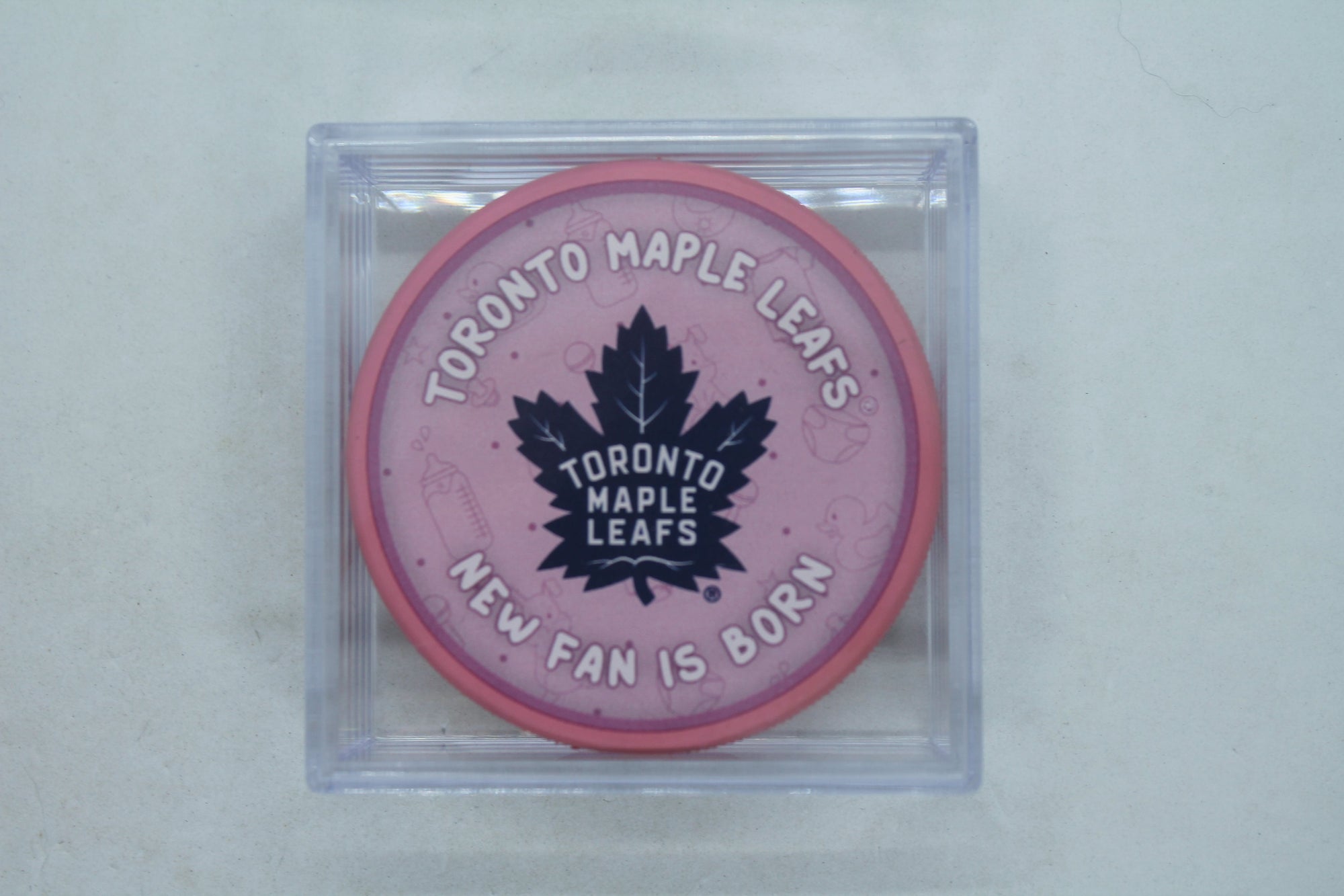 NHL Toronto Maple Leafs "New Fan is Born" Hockey Puck (Pink) in Puck Case