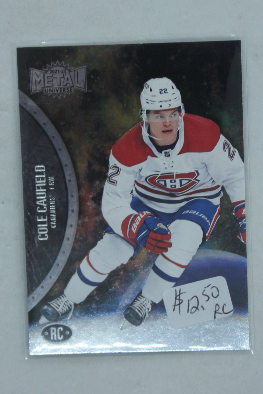Cole Caufield 2021-22 Skybox Metal Universe Rookies Rookie Card