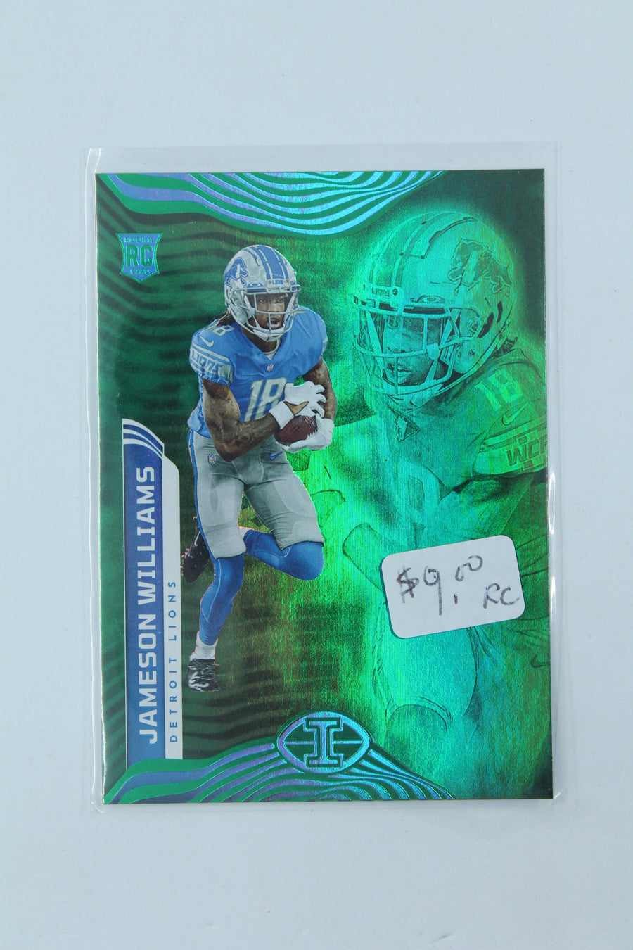 Jameson Williams 2022 Panini Illusions Trophy Collection Emerald Rookie Card