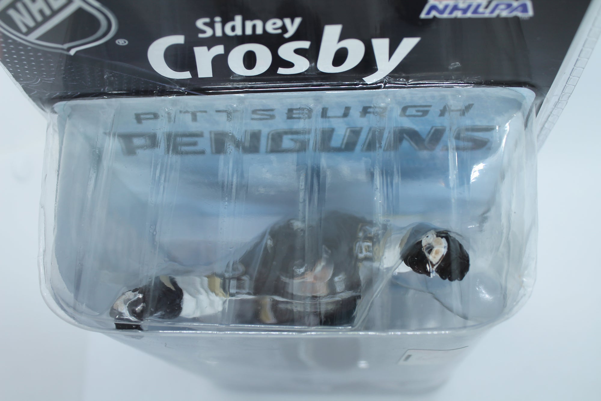 Sidney Crosby Series 25 Mcfarlane - Pittsburgh Penguins - (bend in top of clamshell)