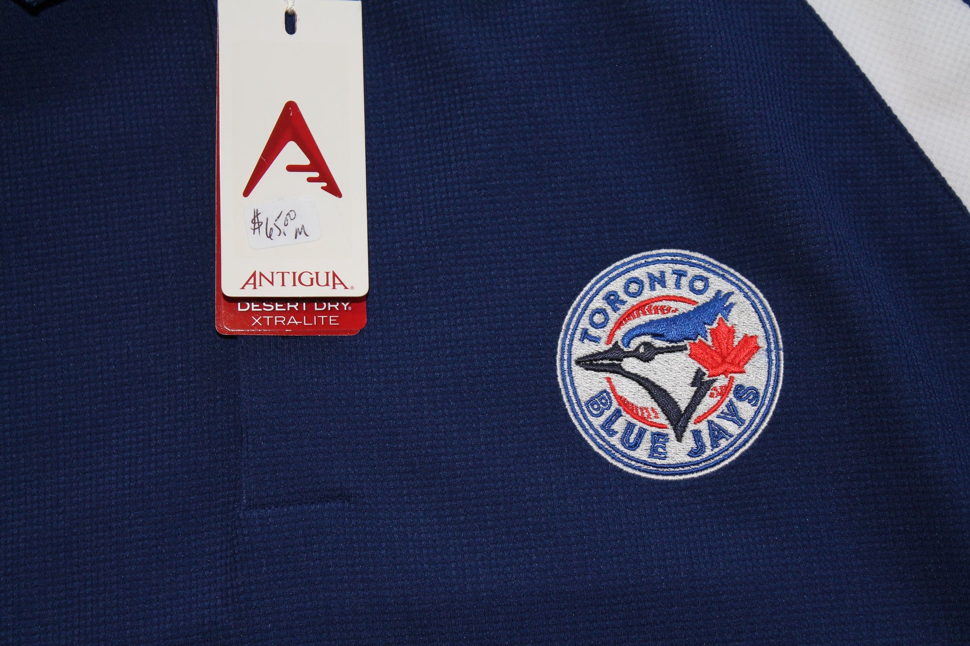 MLB Toronto Blue Jays Men's Antigua Golf Shirt - Medium