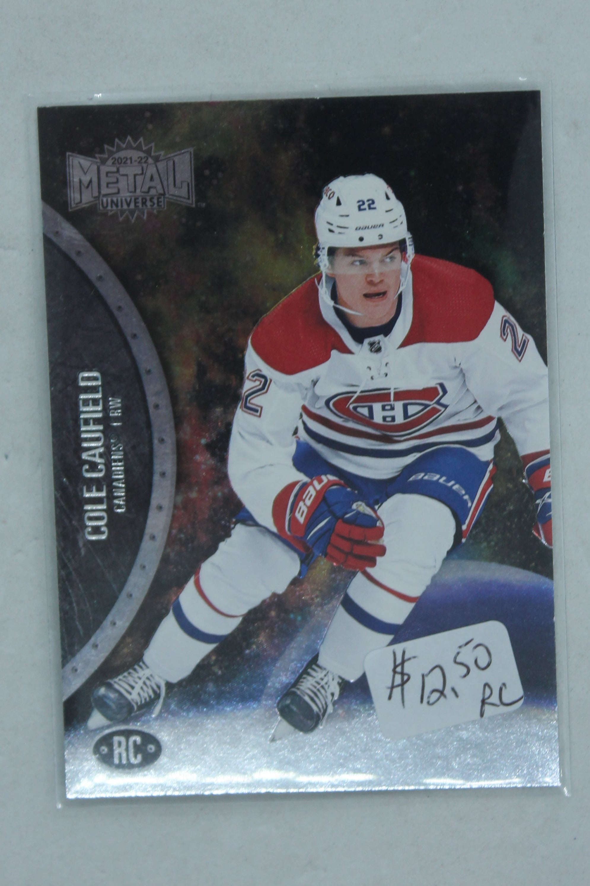 Cole Caufield 2021-22 Skybox Metal Universe Rookies Rookie Card