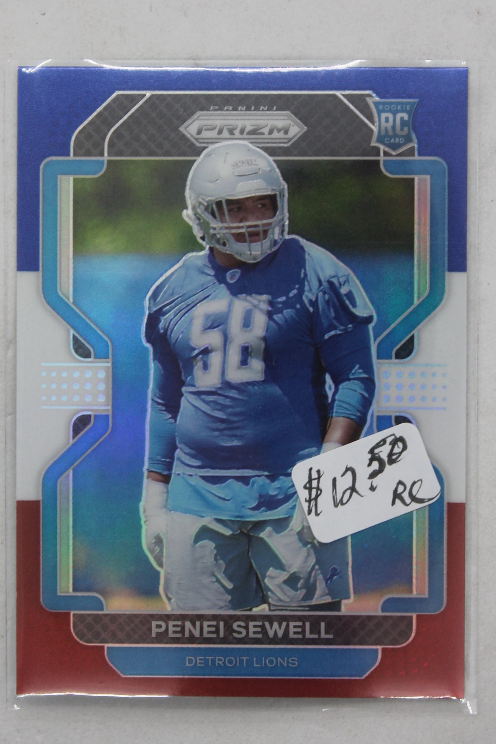 Penei Sewell Panini Prizm Red, White & Blue Prizm Rookie Rookie Card
