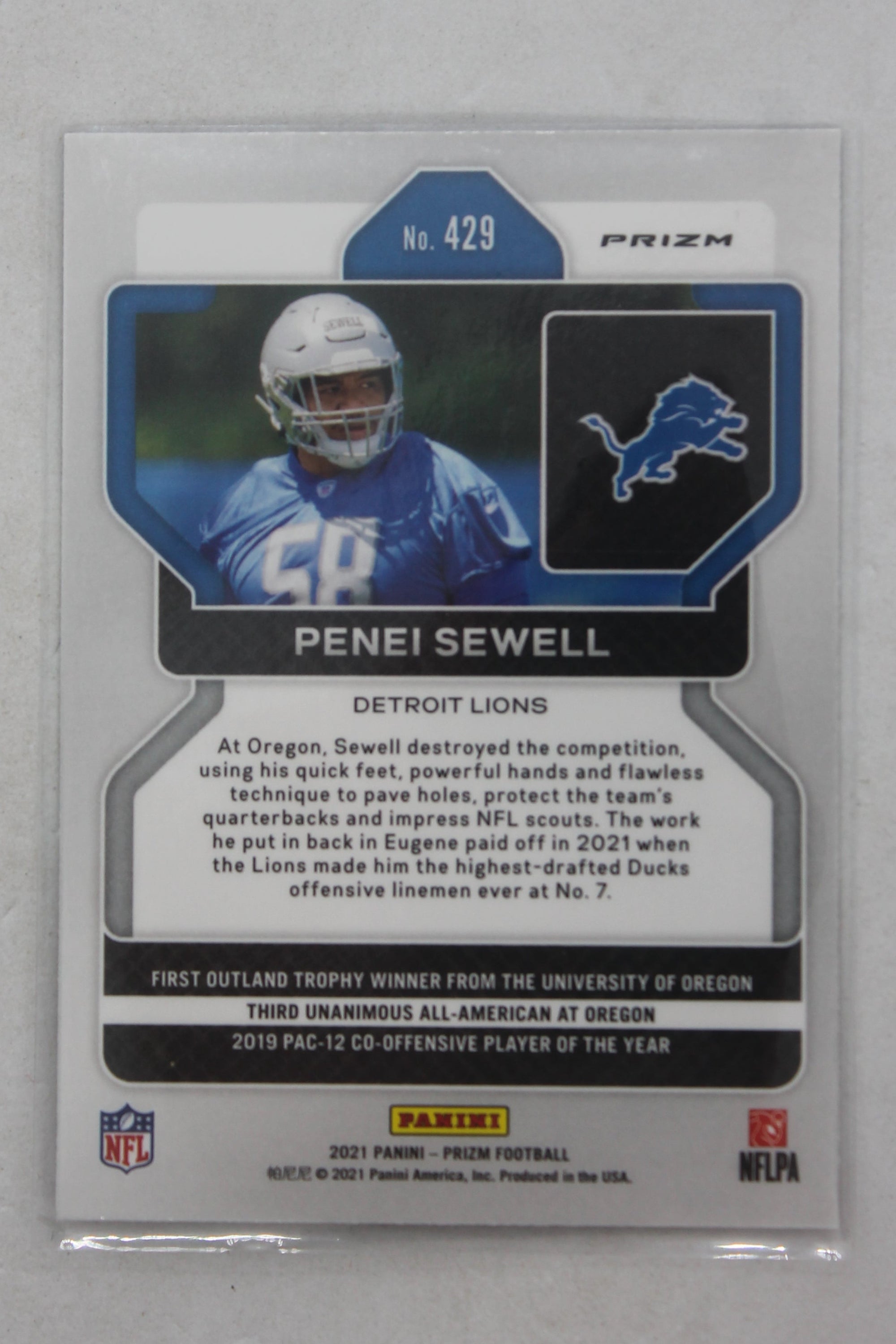 Penei Sewell Panini Prizm Red, White & Blue Prizm Rookie Rookie Card