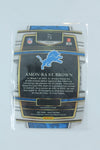 Amon-Ra St. Brown 2021 Panini Select - Red & Yellow Prizm Die-Cut Rookie Card