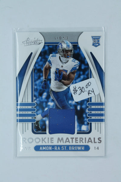 Amon-Ra St. Brown 2021 Panini Absolute Rookie Materials Rookie Year Card