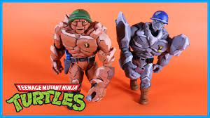 NECA TMNT Teenage Mutant Ninja Turtles Traag and Granitor (2-Pack) -Nickelodeon
